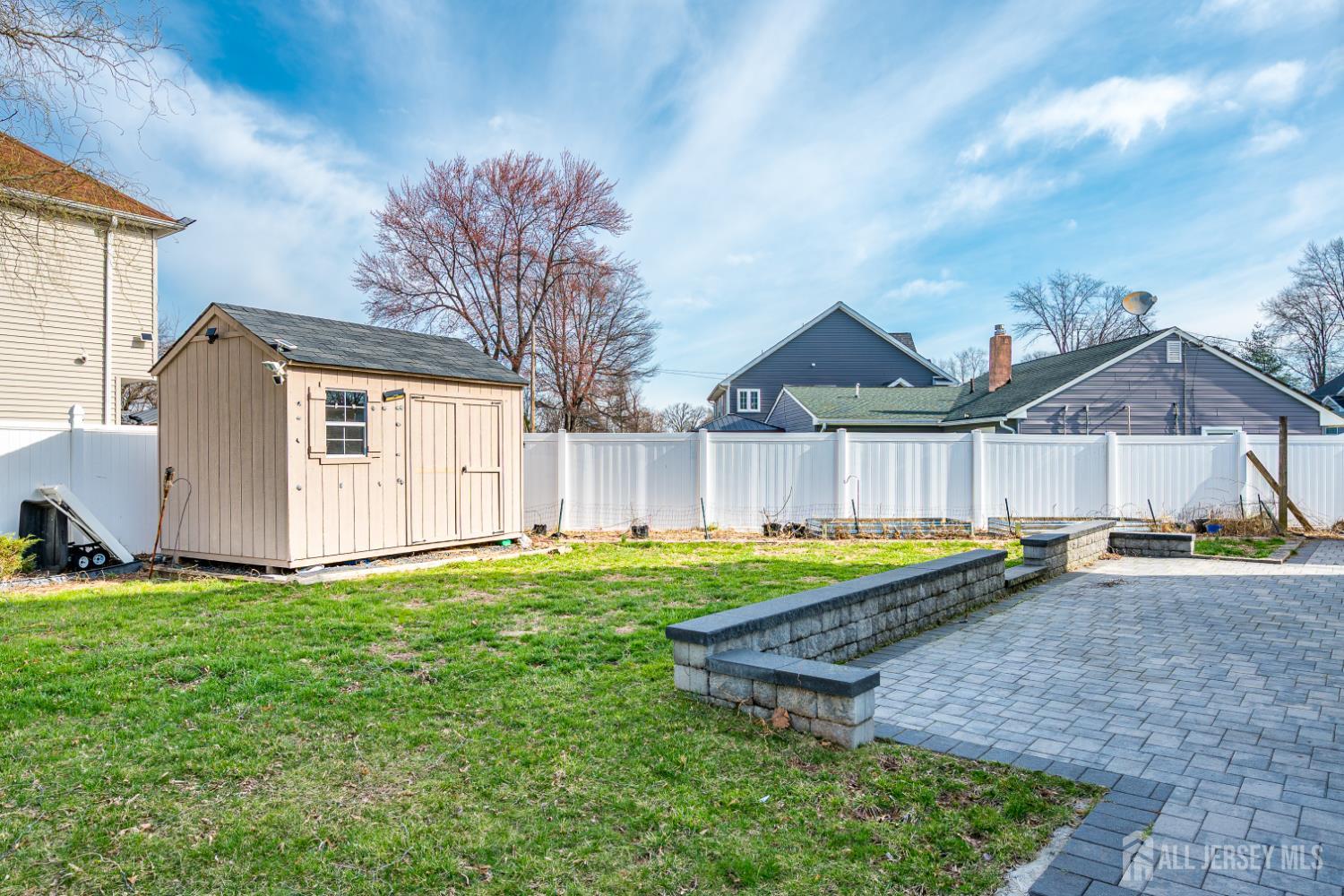 17 Idlewild Road Edison, NJ 08817 - Photo 35 of 36 a view of a house with backyard and sitting area