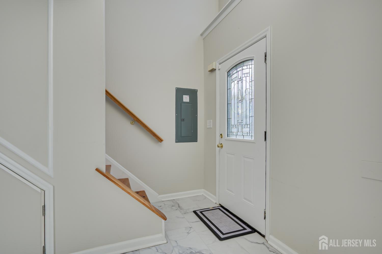 17 Idlewild Road Edison, NJ 08817 - Photo 5 of 36 a view of an entryway with staircase