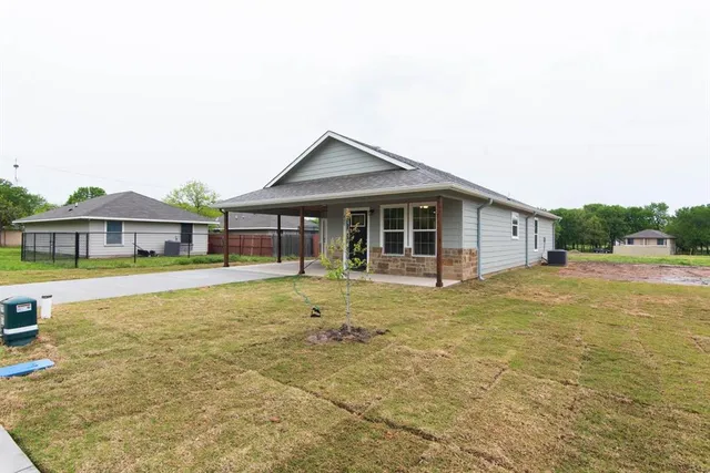a front view of a house with swimming pool