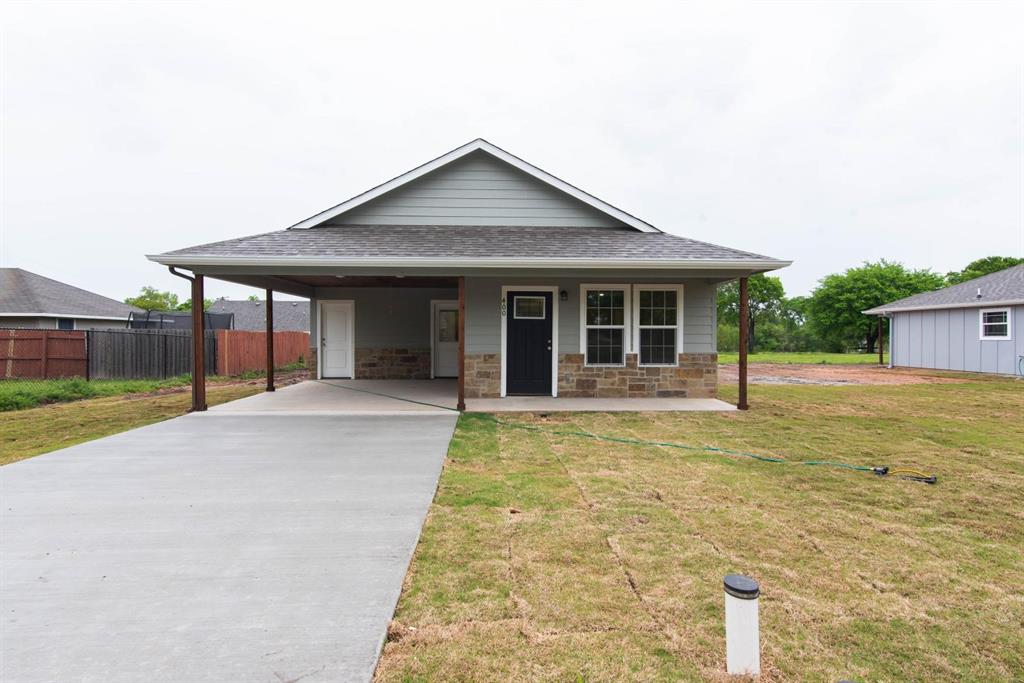 400 Allen Avenue Bonham, TX 75418 - Photo 2 of 14 a view of a house with a yard and sitting area