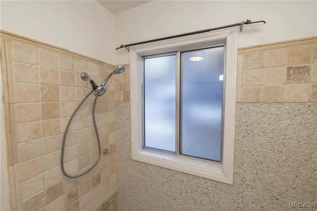 a bathroom with a sink toilet and vanity
