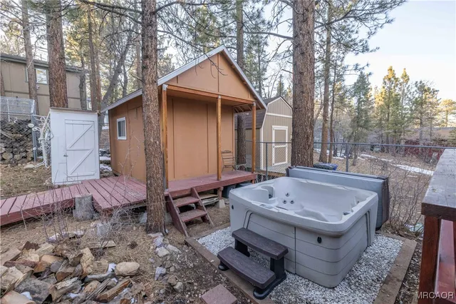 a bathroom with a bathtub and shower
