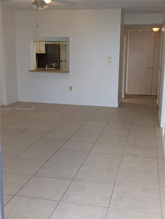 a living room with a flat screen tv and a fireplace