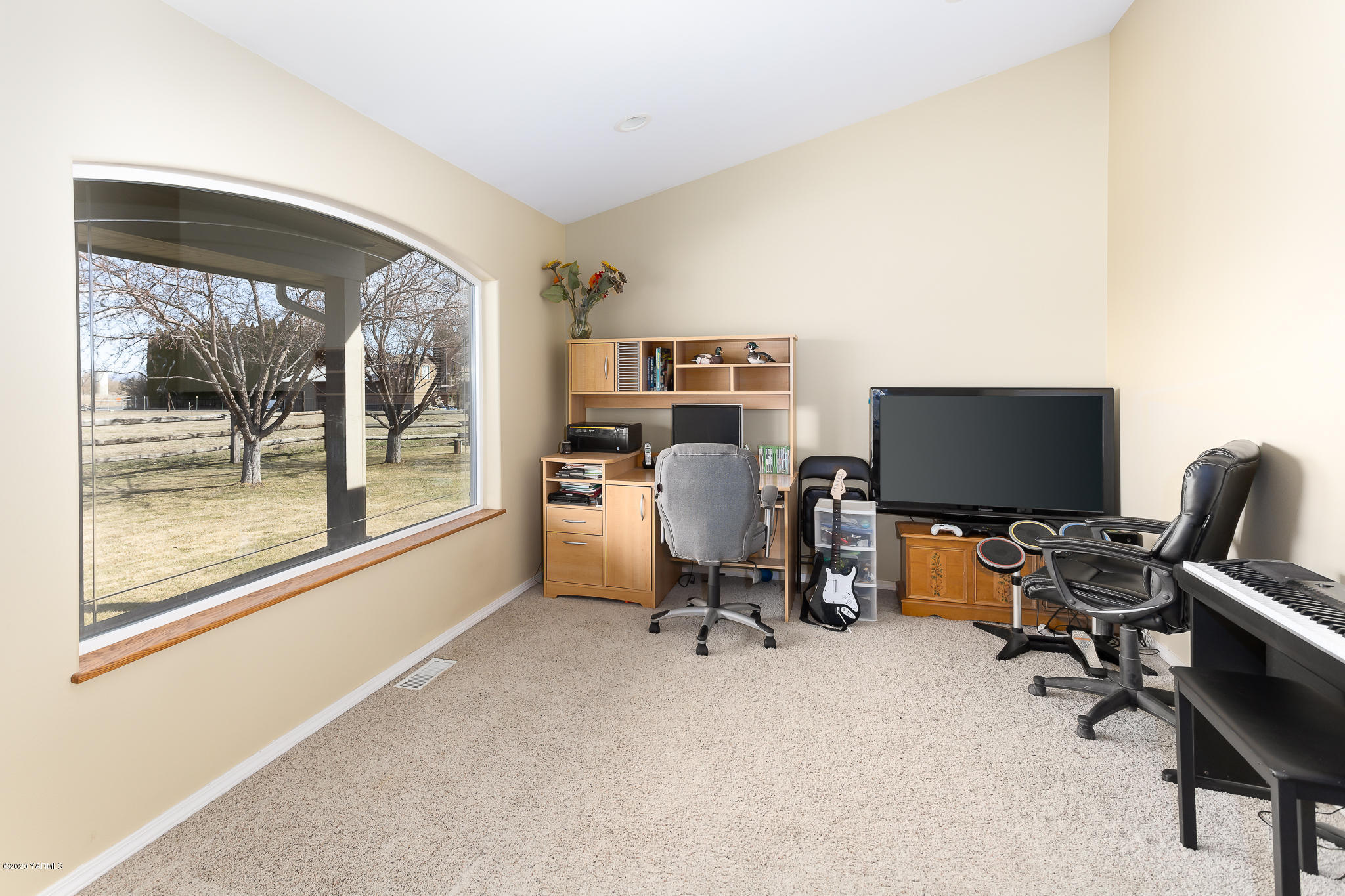 12100 Rutherford Road Yakima, WA 98903 - Photo 16 of 36 a view of a workspace with furniture and a window