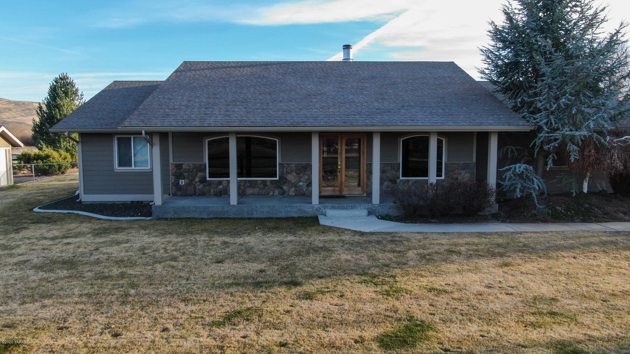 12100 Rutherford Road Yakima, WA 98903 - Photo 35 of 36 a view of a house with a yard plants and large tree