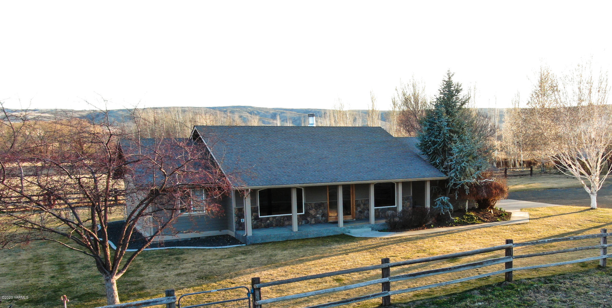 12100 Rutherford Road Yakima, WA 98903 - Photo 36 of 36 a view of a house with a yard