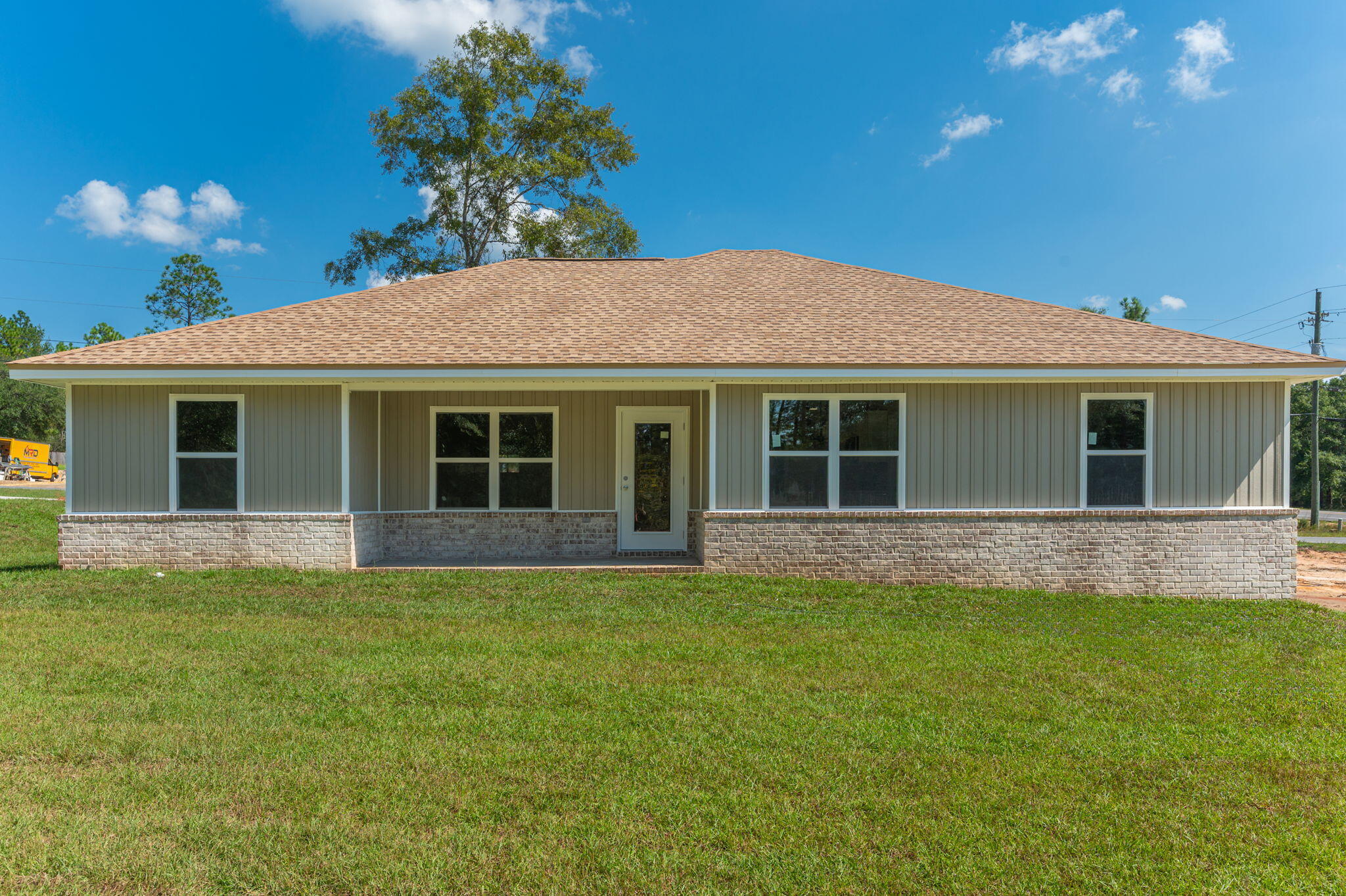 6012 Sand Hill Road Crestview, FL 32539 - Photo 38 of 45 a front view of house with yard and green space