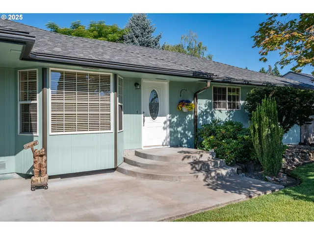 a front view of a house with a garage