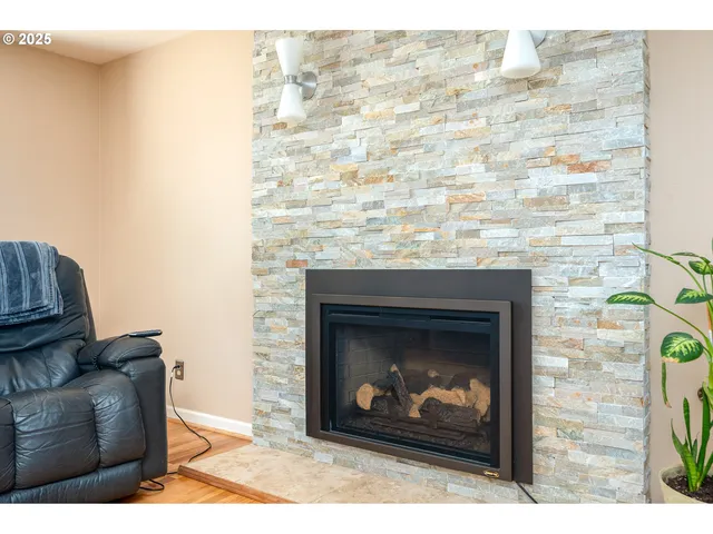 a living room with a fireplace