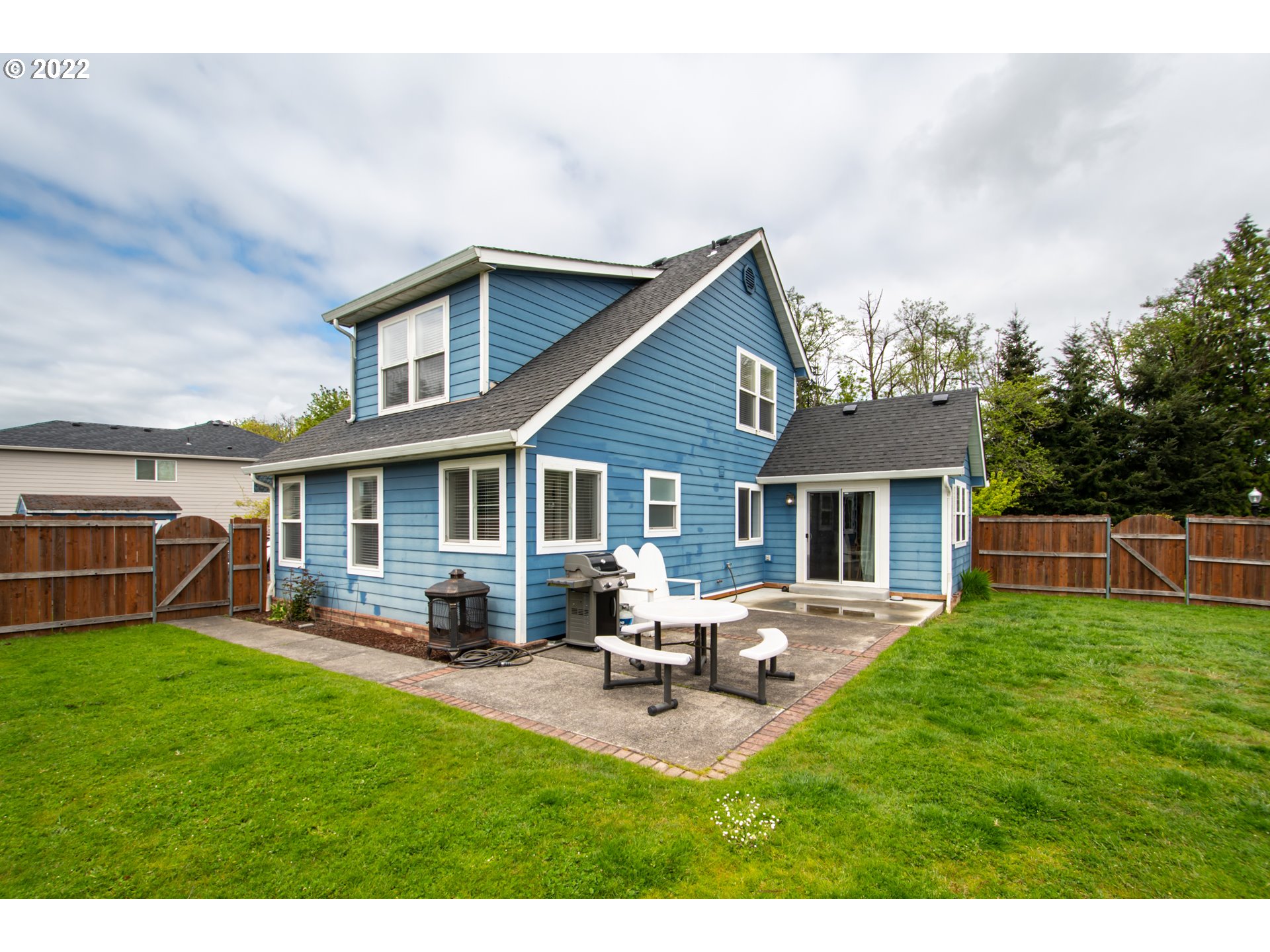 2055 South Sevier Road Ridgefield, WA 98642 - Photo 24 of 31 a view of a house with a yard porch and sitting area