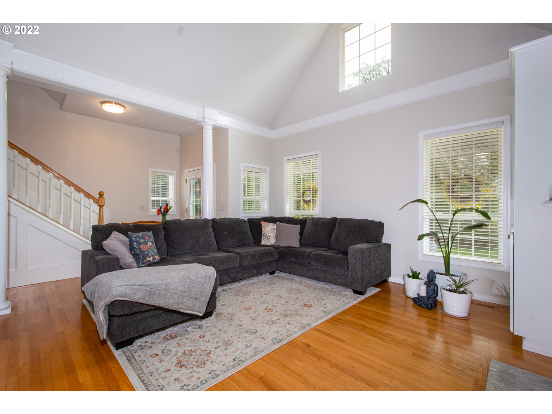 2055 South Sevier Road Ridgefield, WA 98642 - Photo 6 of 31 a living room with furniture and a wooden floor