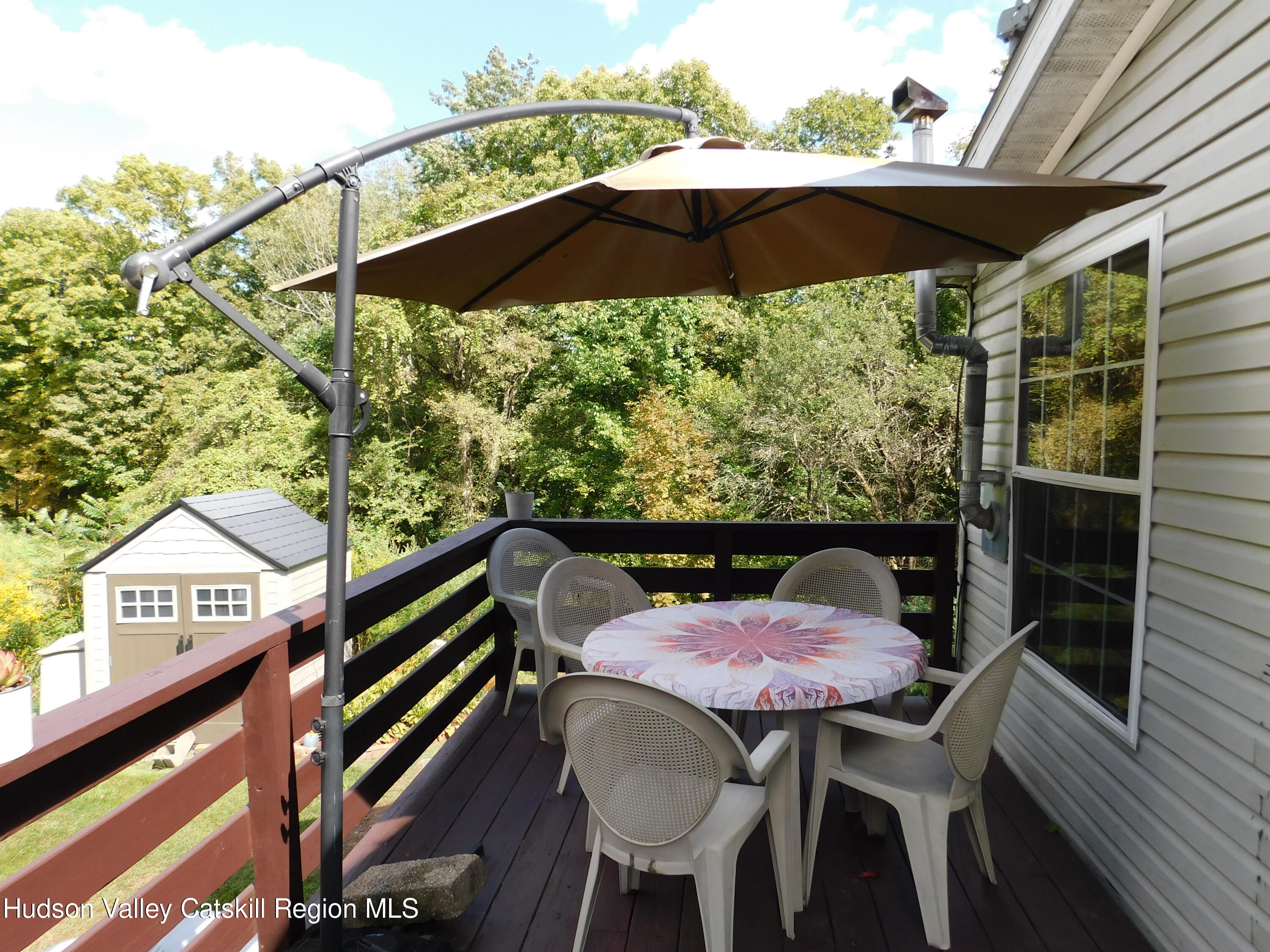 156 Lippman Road Hurleyville, NY 12747 - Photo 20 of 22 a view of a chairs and table in the balcony