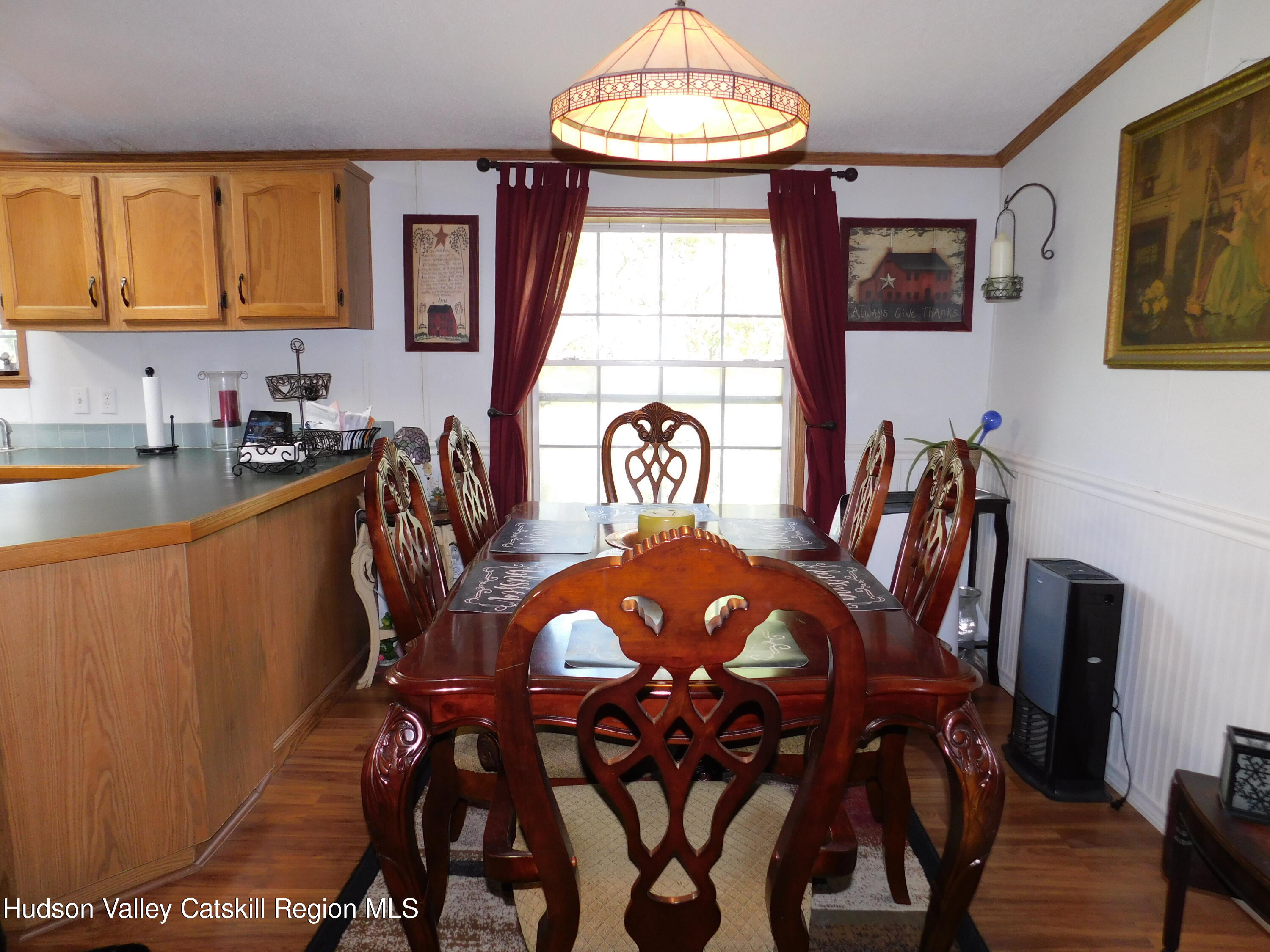 156 Lippman Road Hurleyville, NY 12747 - Photo 6 of 22 a view of a dining room with furniture