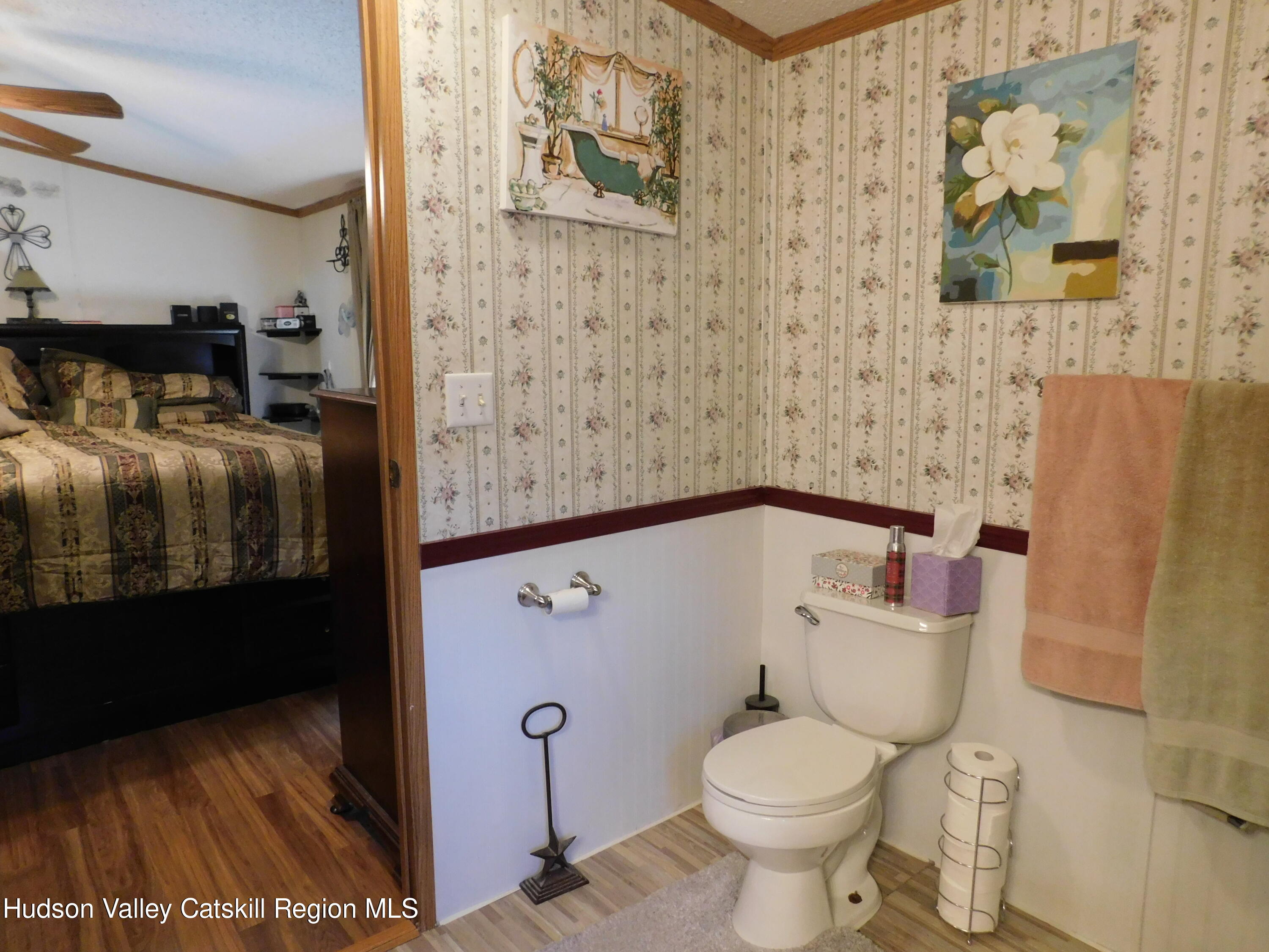 156 Lippman Road Hurleyville, NY 12747 - Photo 10 of 22 a bathroom with a toilet and a shower