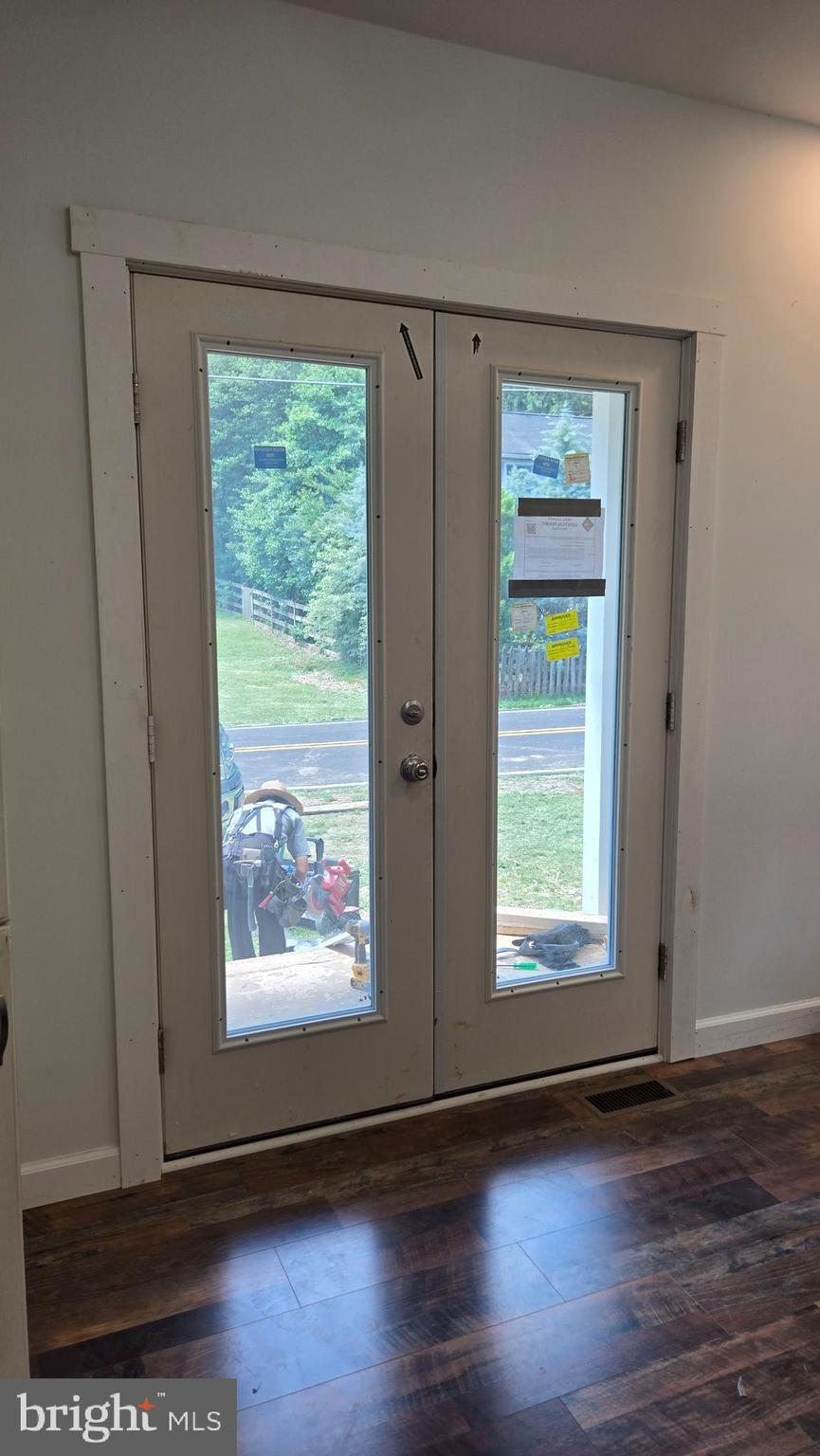 743 Bell Manor Road Conowingo, MD 21918 - Photo 5 of 28 Natural light from kitchen doors to side porch