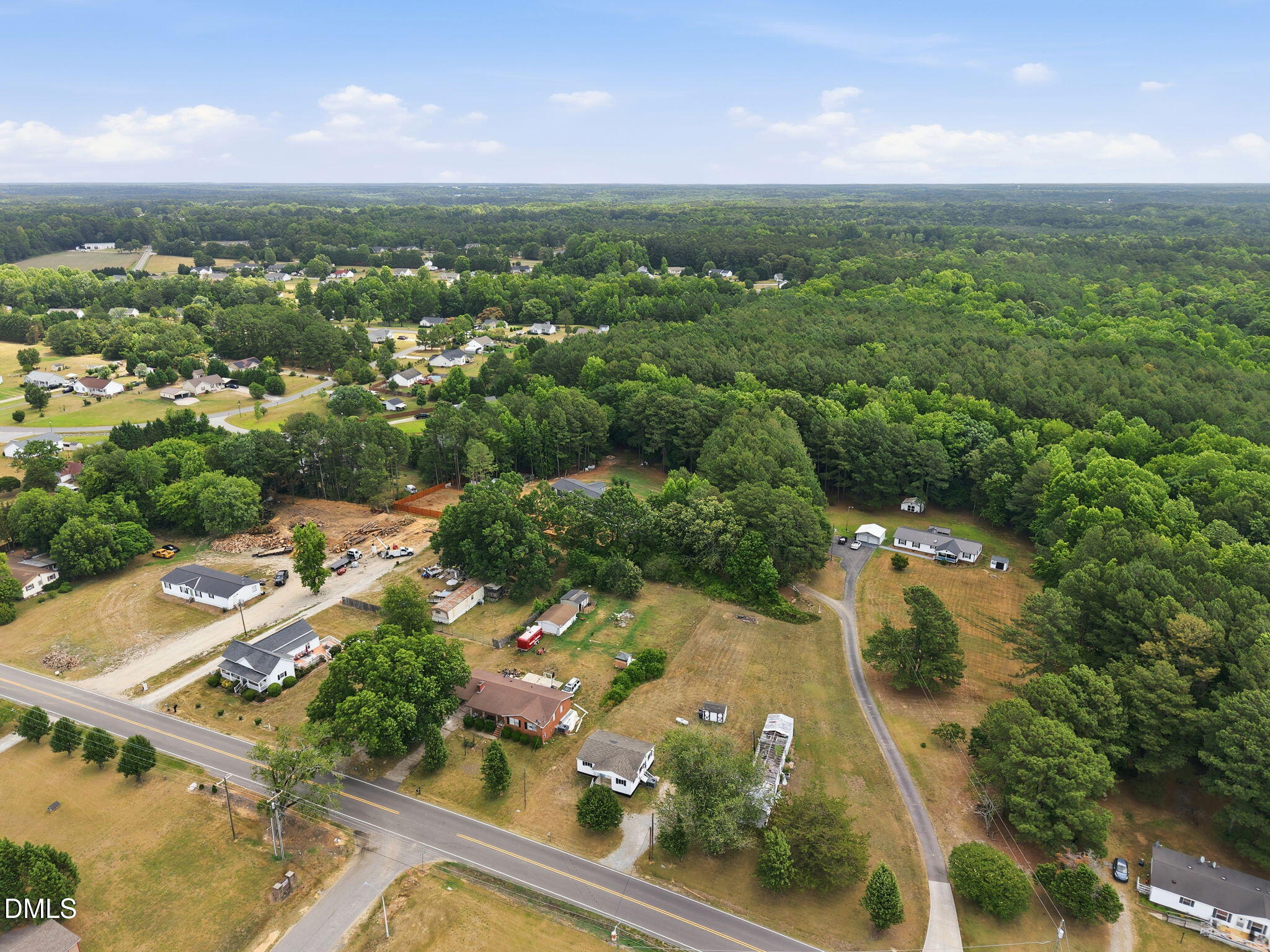 1758 Barber Mill Road Clayton, NC 27520 - Photo 40 of 41 an aerial view of residential houses with outdoor space