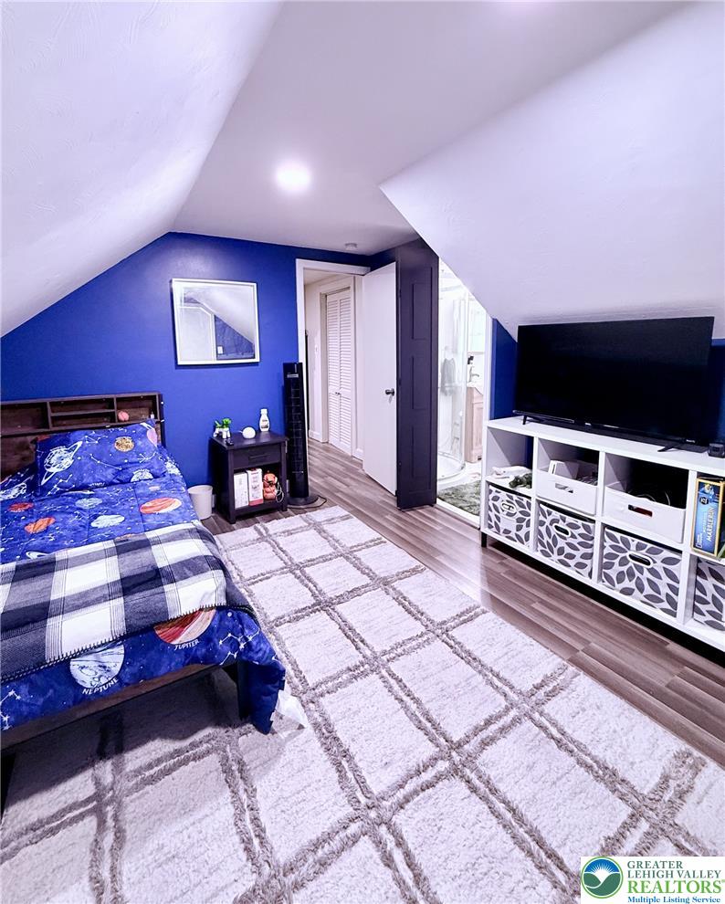 1275 Macada Road Bethlehem, PA 18017 - Photo 64 of 87 a bedroom with furniture and a flat screen tv