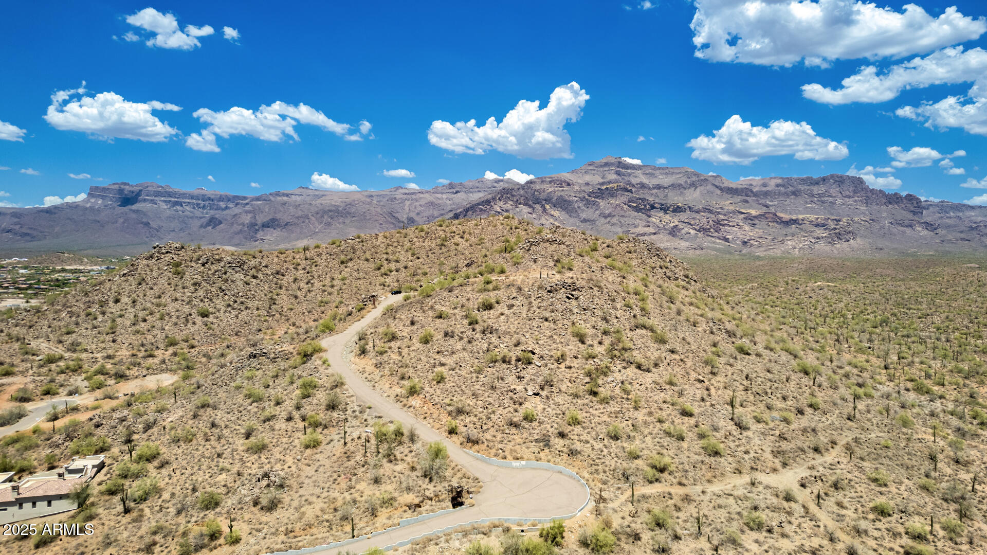 11198 East Sunset Peak Road, Unit 5 Gold Canyon, AZ 85118 - Photo 25 of 28 a view of a fireplace in middle of a building