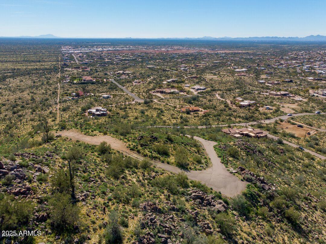 11198 East Sunset Peak Road, Unit 5 Gold Canyon, AZ 85118 - Photo 4 of 28 an aerial view of residential houses with city view