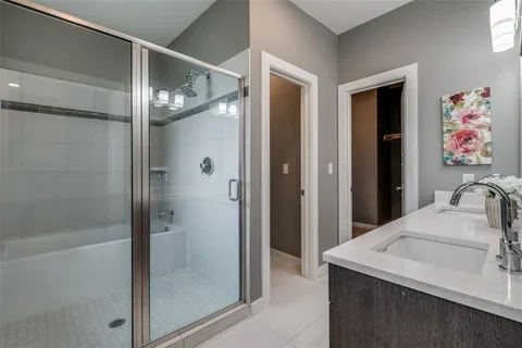 a view of balcony with wooden floor and fence