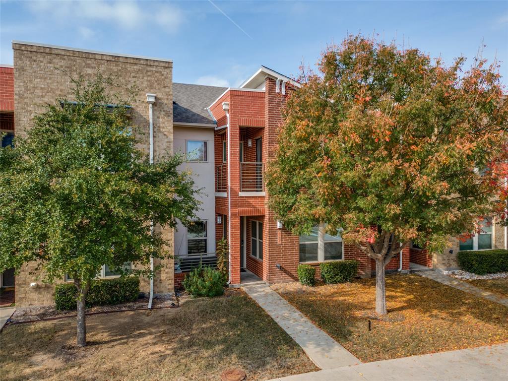 349 Tonga Street Dallas, TX 75203 - Photo 3 of 40 a front view of a house with a tree