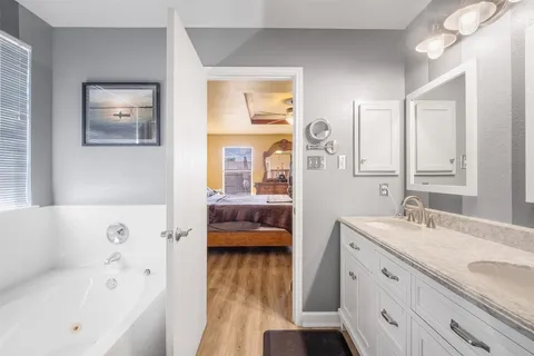 a bed room with a bed and a window