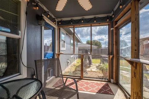 a en suite spacious bathroom with a tub double vanity and mirror
