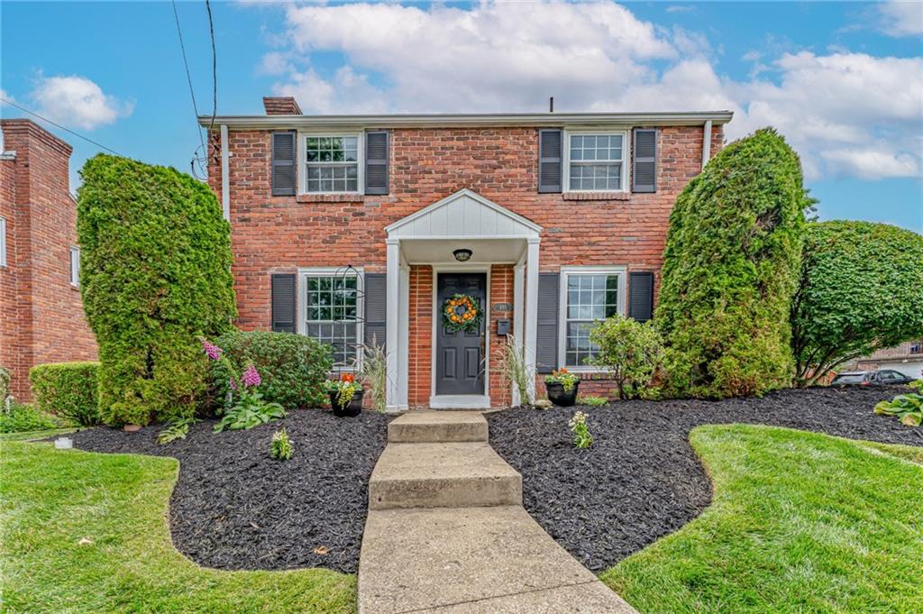 495 Old Farm Road Pittsburgh, PA 15228 - Photo 1 of 25 a front view of a house with garden