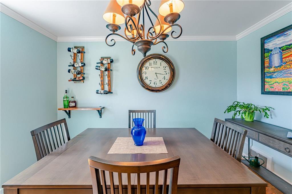495 Old Farm Road Pittsburgh, PA 15228 - Photo 7 of 25 a view of a dining room with furniture and toys