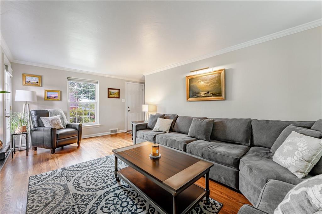 495 Old Farm Road Pittsburgh, PA 15228 - Photo 8 of 25 a living room with furniture and a rug