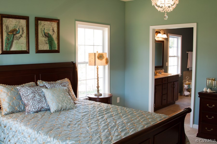 11400 Avening Road Midlothian, VA 23112 - Photo 7 of 10 a bedroom with a bed and a window