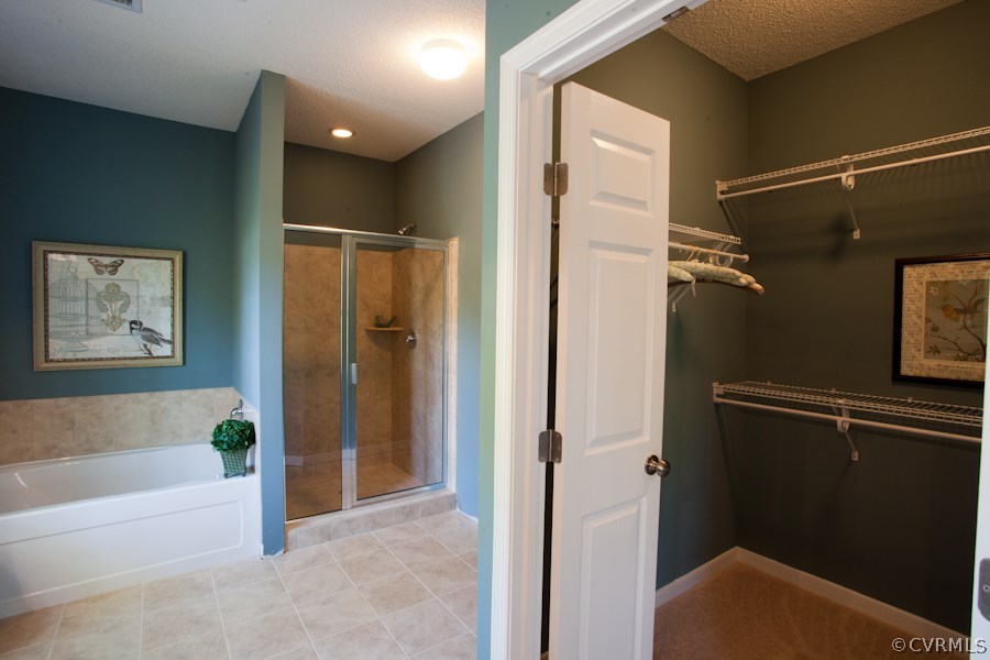 11400 Avening Road Midlothian, VA 23112 - Photo 9 of 10 a bathroom with a shower and a tub