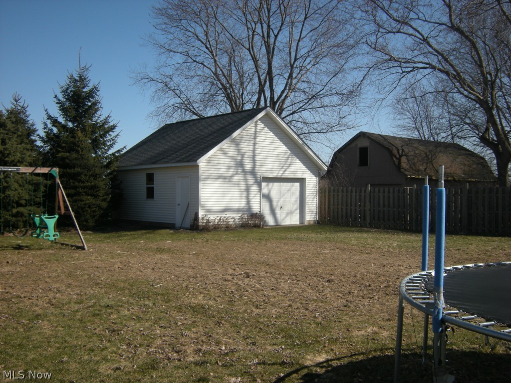 35780 Mills Road Avon, OH 44011 - Photo 21 of 24 Additional 2 car outbuilding on private .6 acre lot!