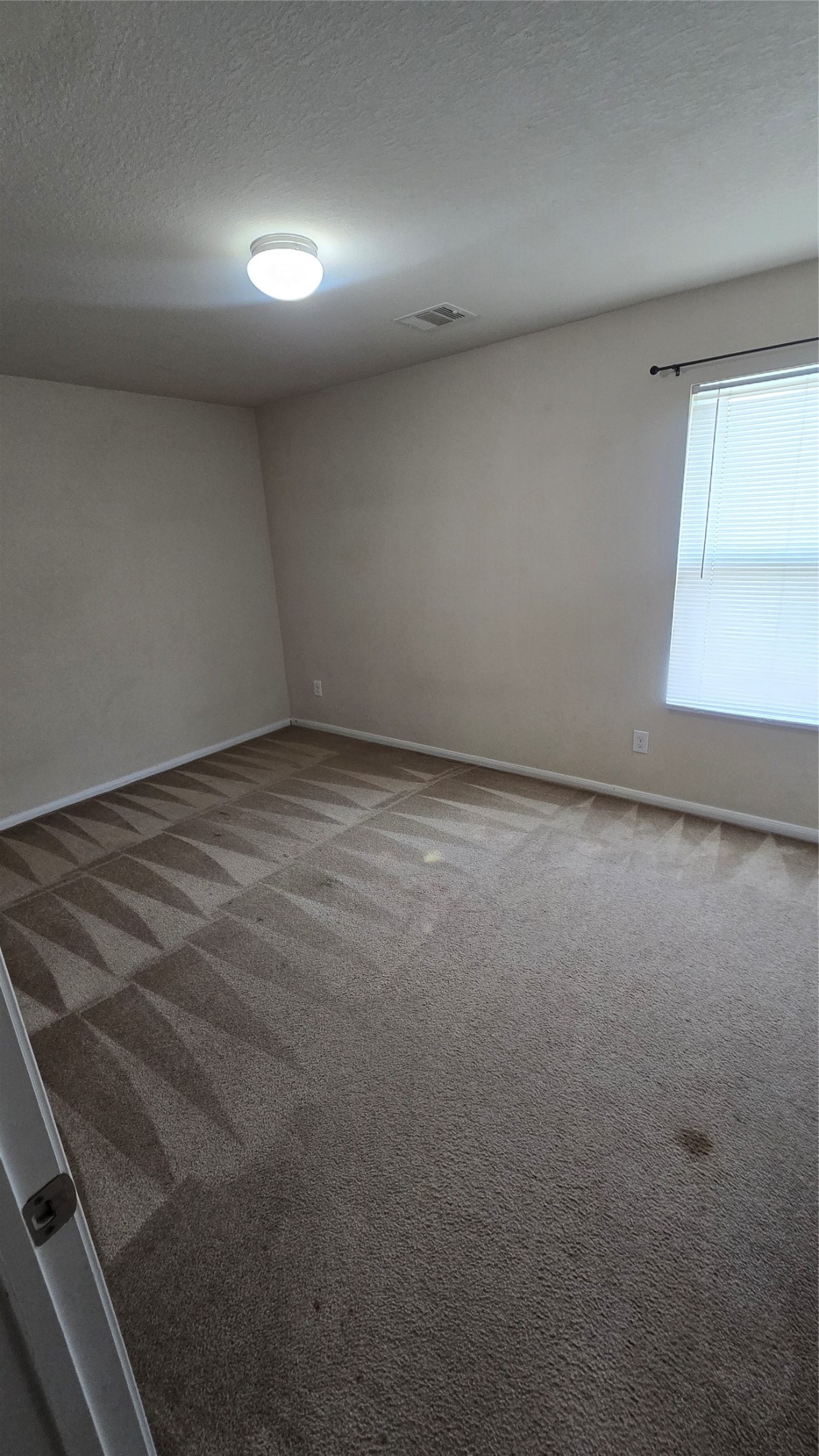 14819 Isle Of Pines Court Houston, TX 77049 - Photo 13 of 14 a view of room and window