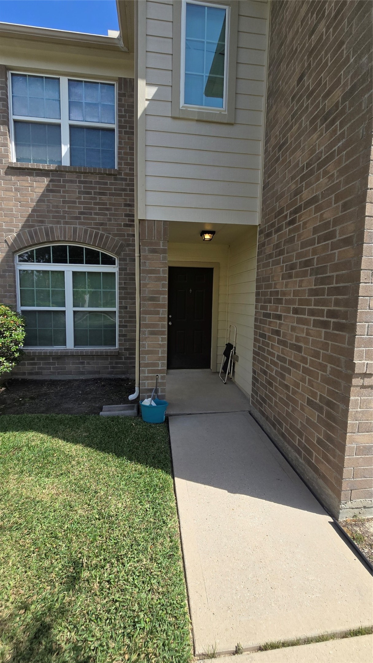 14819 Isle Of Pines Court Houston, TX 77049 - Photo 2 of 14 a front view of a house with garden