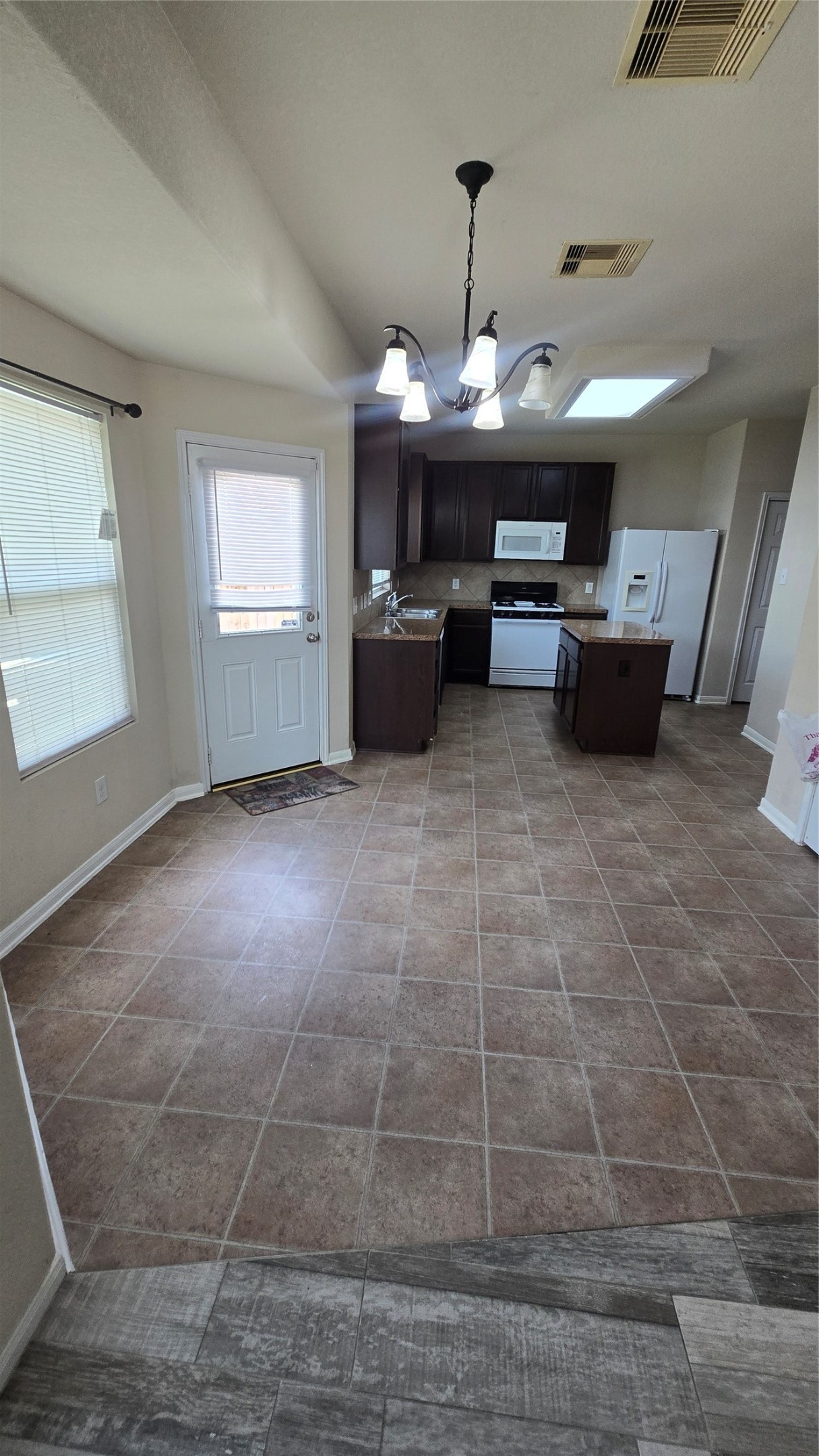 14819 Isle Of Pines Court Houston, TX 77049 - Photo 5 of 14 a view of a big room with windows