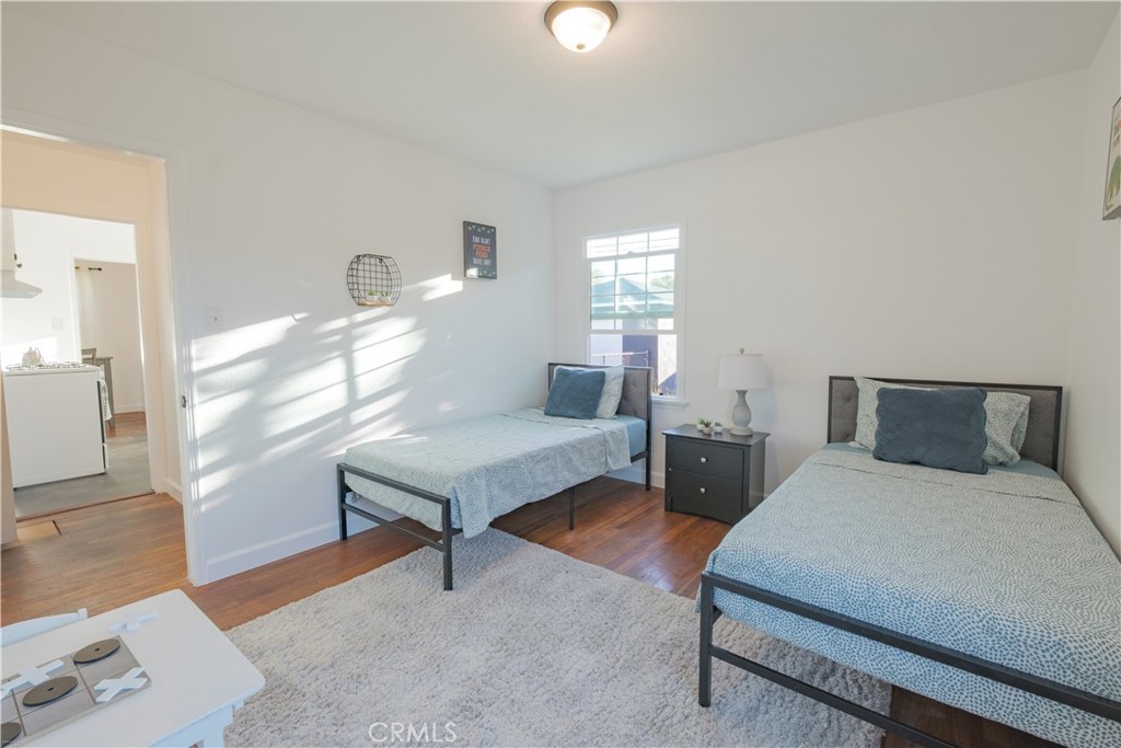4829 Walnut Avenue Long Beach, CA 90807 - Photo 15 of 23 a bedroom with two beds and a window