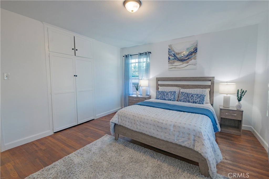 4829 Walnut Avenue Long Beach, CA 90807 - Photo 17 of 23 a bedroom with a bed and a window