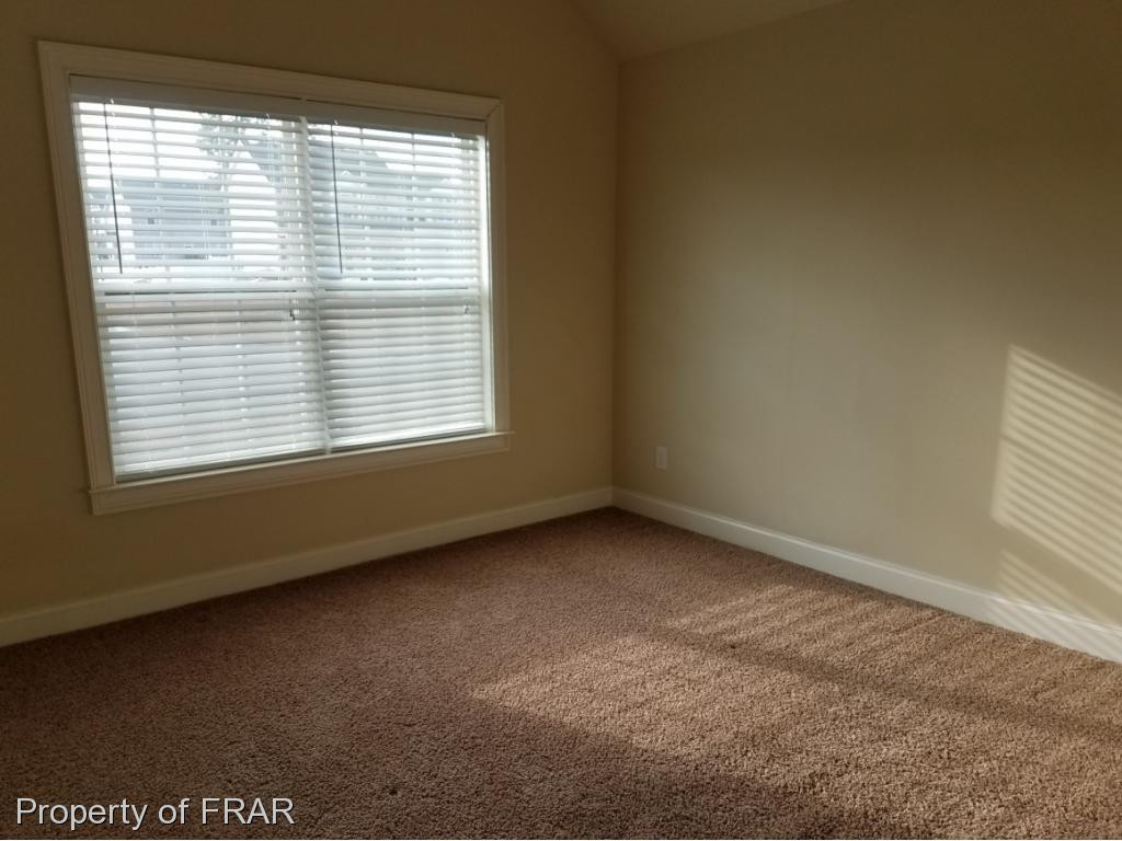355 Regimental Drive Cameron, NC 28326 - Photo 15 of 19 a view of a room that has a window in it