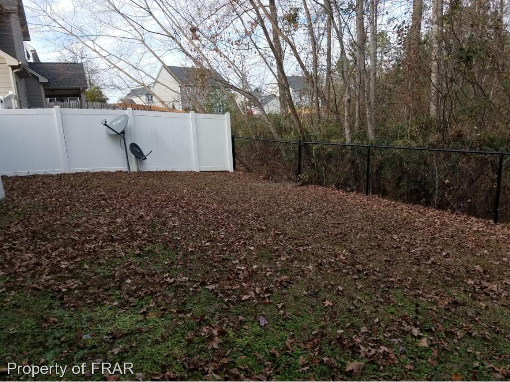 355 Regimental Drive Cameron, NC 28326 - Photo 18 of 19 a backyard of a house