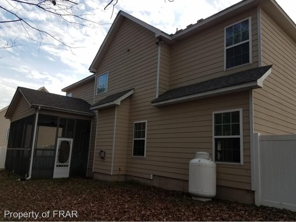 355 Regimental Drive Cameron, NC 28326 - Photo 19 of 19 a view of house with patio