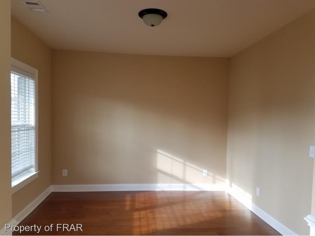 355 Regimental Drive Cameron, NC 28326 - Photo 3 of 19 a view of an empty room and window