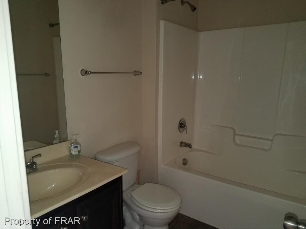 355 Regimental Drive Cameron, NC 28326 - Photo 7 of 19 a bathroom with a sink toilet and shower