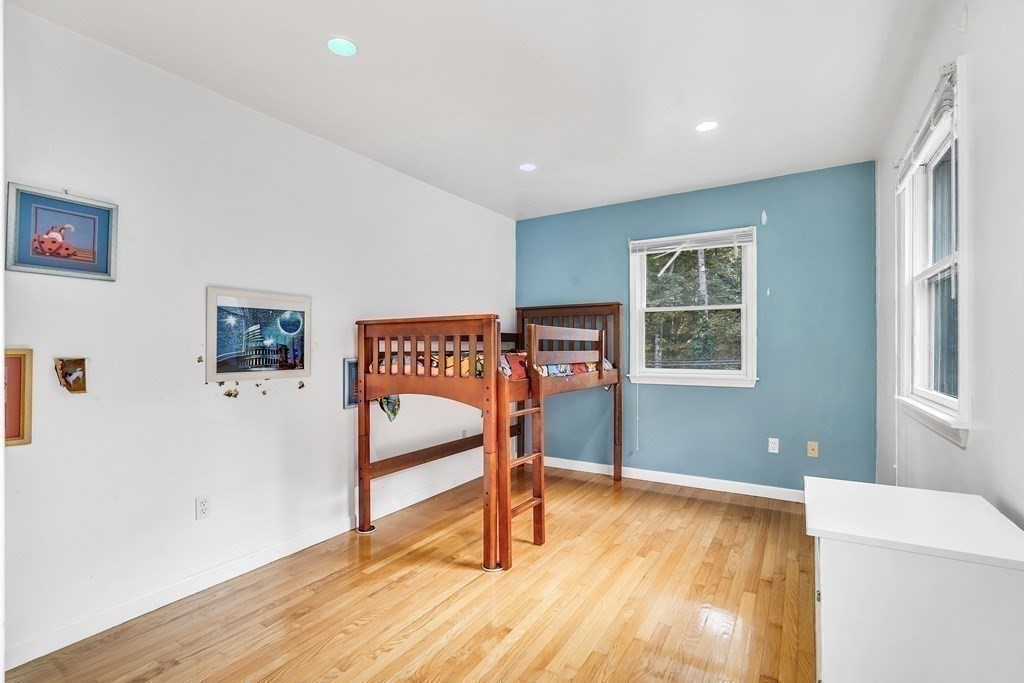 3 Goodnow Road Sudbury, MA 01776 - Photo 17 of 34 a view of an empty room with window and wooden floor