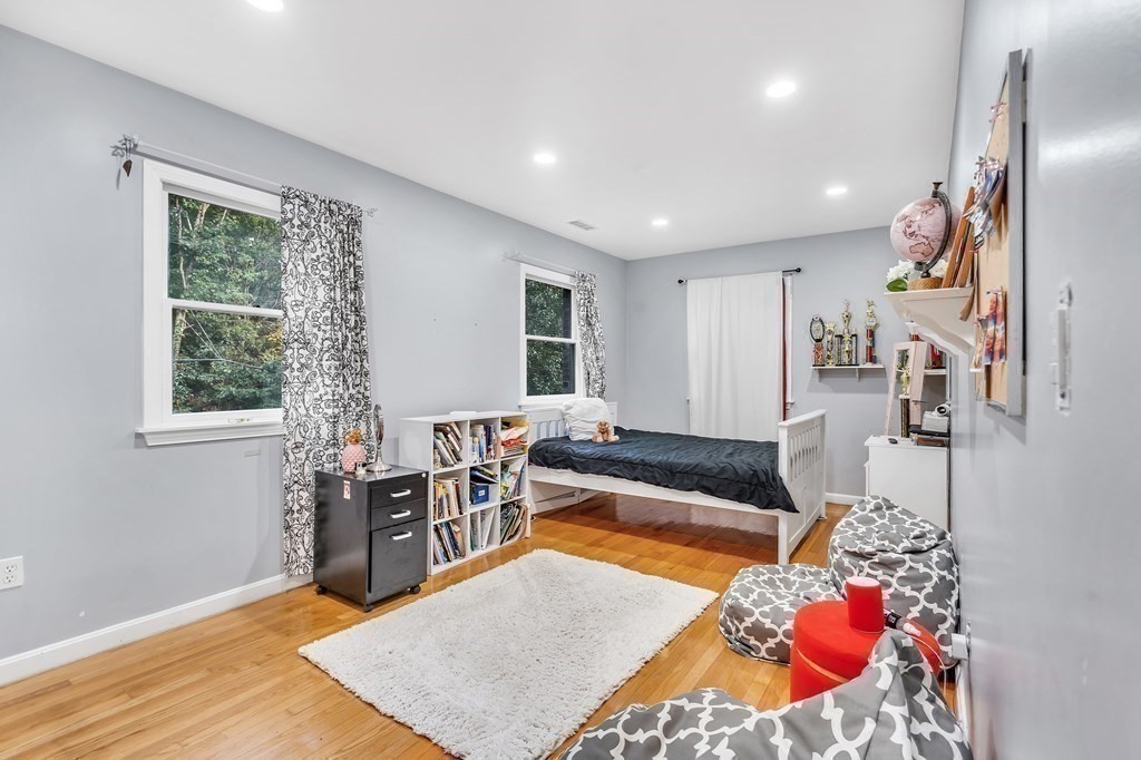 3 Goodnow Road Sudbury, MA 01776 - Photo 18 of 34 a living room with furniture and a window