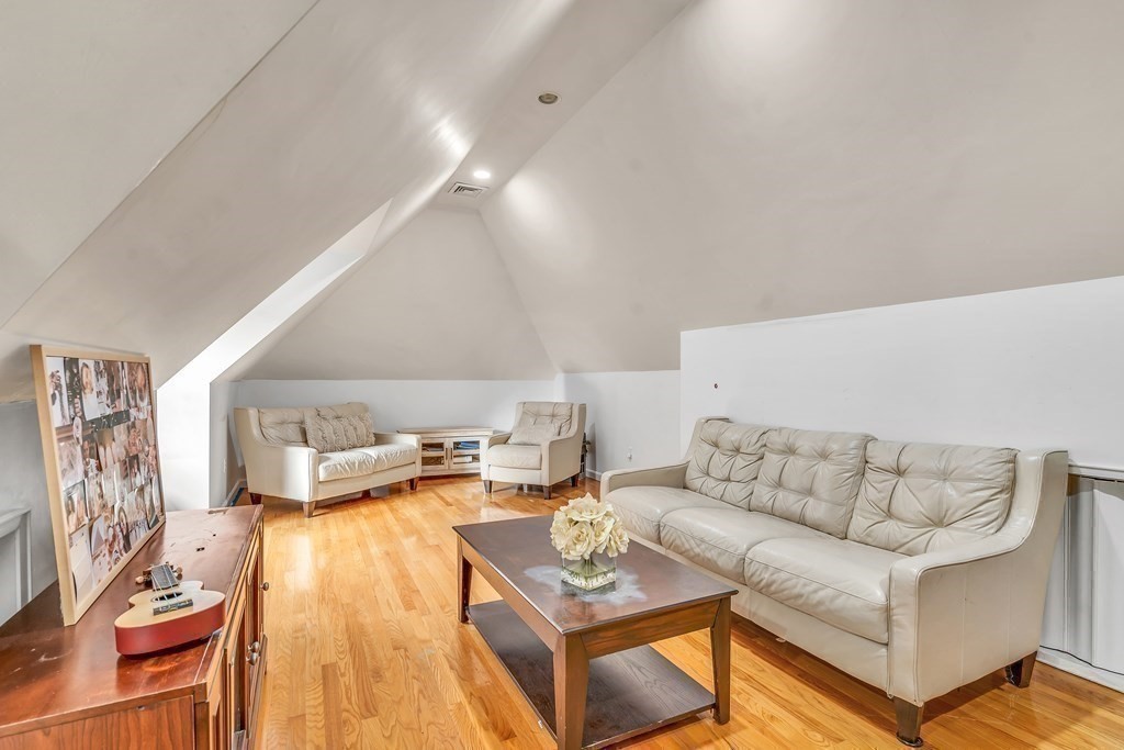 3 Goodnow Road Sudbury, MA 01776 - Photo 21 of 34 a living room with furniture and a couch