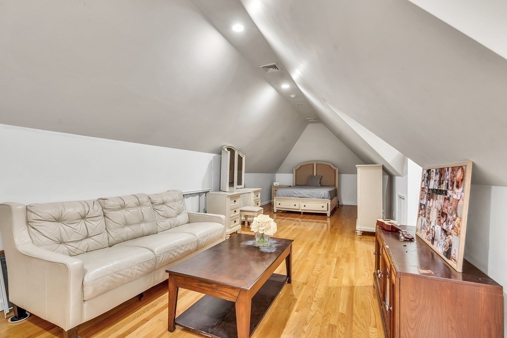 3 Goodnow Road Sudbury, MA 01776 - Photo 22 of 34 a living room with furniture and a wooden floor