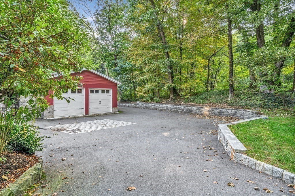 3 Goodnow Road Sudbury, MA 01776 - Photo 27 of 34 a view of a house with a yard