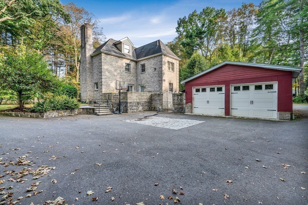 3 Goodnow Road Sudbury, MA 01776 - Photo 28 of 34 a view of a house with a yard