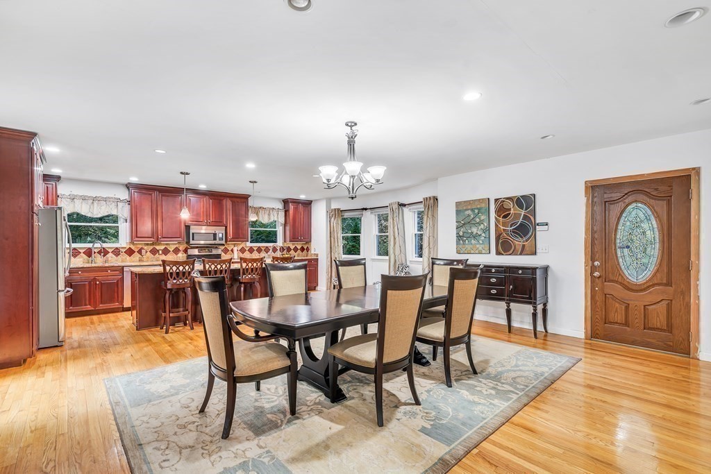 3 Goodnow Road Sudbury, MA 01776 - Photo 8 of 34 a view of a dining room with furniture window and wooden floor